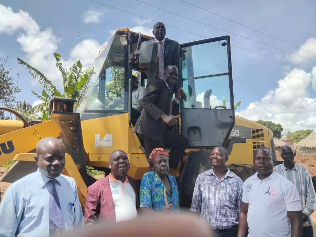 District leaders including the Resident District Commissioner Festus Ayikobua, LCV chairperson James Oruna Oyullu and others flag off the road rehabilitation at Pagisi trading center in Paidha Sub-County on Tuesday April 22, 2025. Photo/ Mike Rwothomio