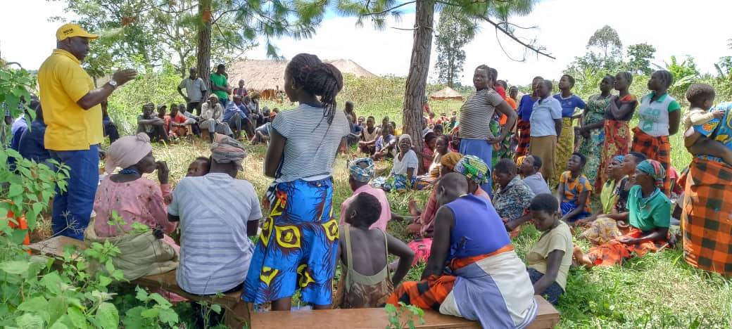 Mothers under their VSLA listen to speech from MP Songa, about Savings.Photos/ Alex Pithua