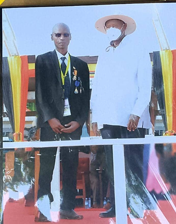 Dr. Amos Nyathirombu posed for a photo With President Museveni in March this year, after receiving Diamond Jubilee medal for His opthalmic contribution to Humanity.