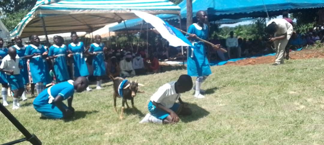 Pupils of Yil Community school in Anyola Parish present their Gift to the King.