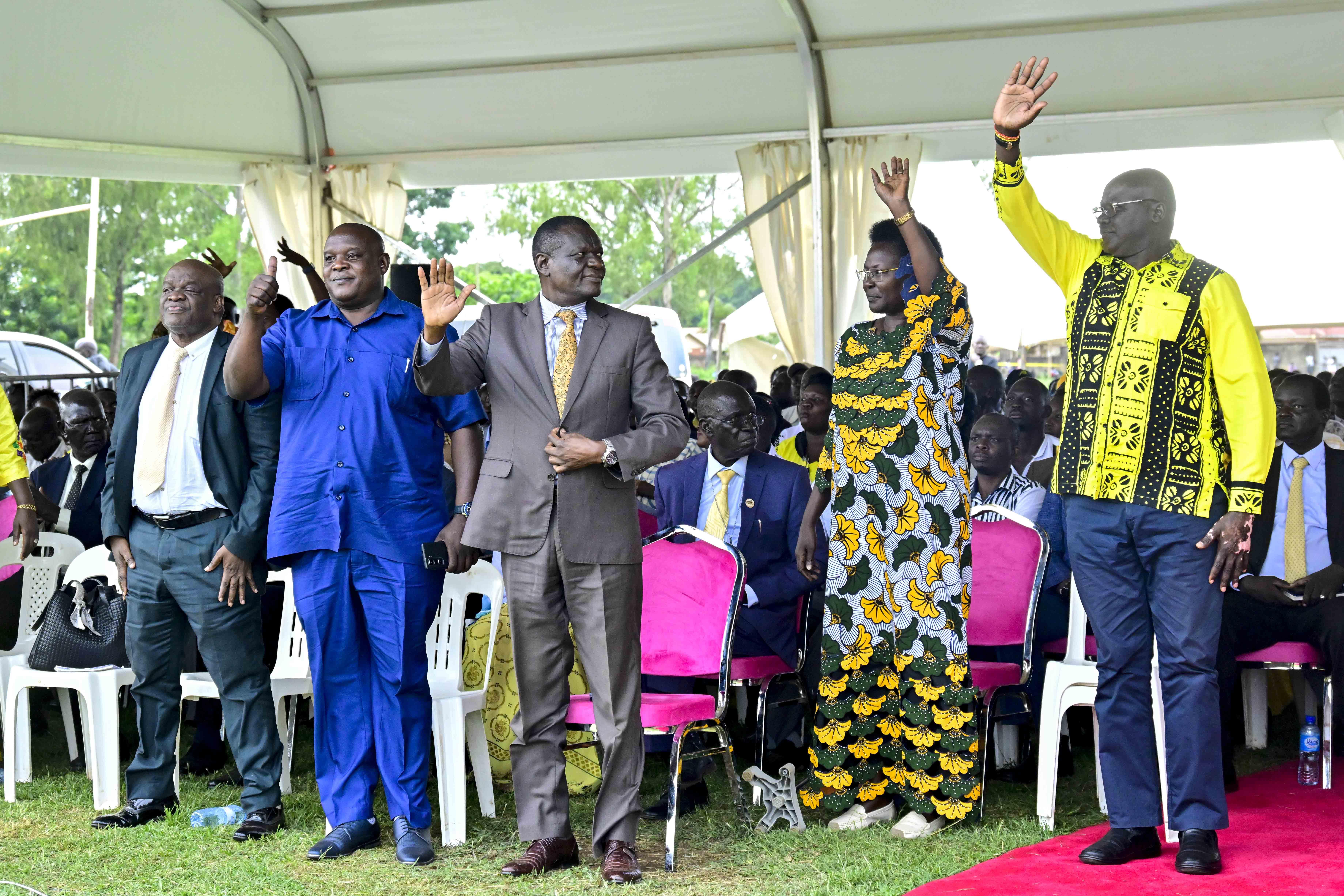 Leaders wave to President Museveni recently as he engage them on cattle war claims