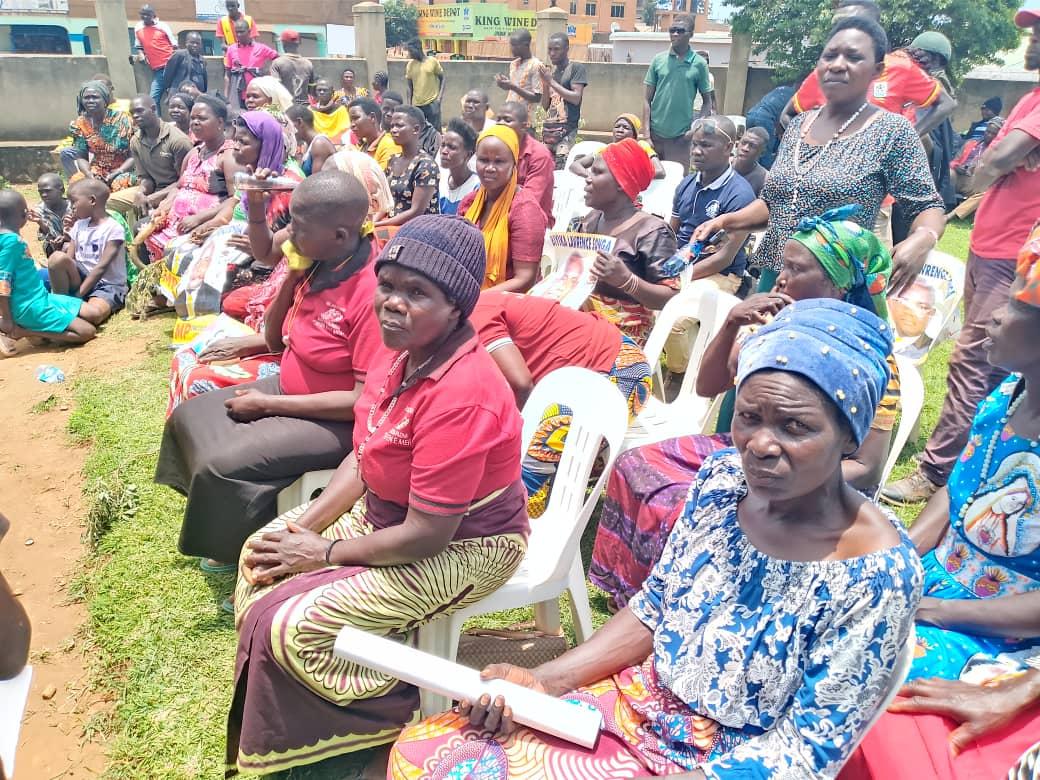 Supporters escort MP Songa Biyika Lawrence to the electoral commission offices in Paidha town council.
