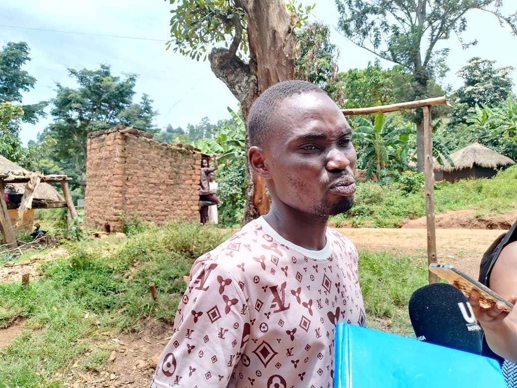 Sabiti God's Compassion, a lead community based trainer on Bio-Liquid Fertilizer at the Pakia Azi Micro-Station in Warr Sub-County, Zombo District,