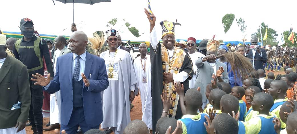Rwoth Phillip Olarker Rauni III accompanied by chief of Umua Chiefdom at Kyamboga University grounds during 15th coronation anniversary