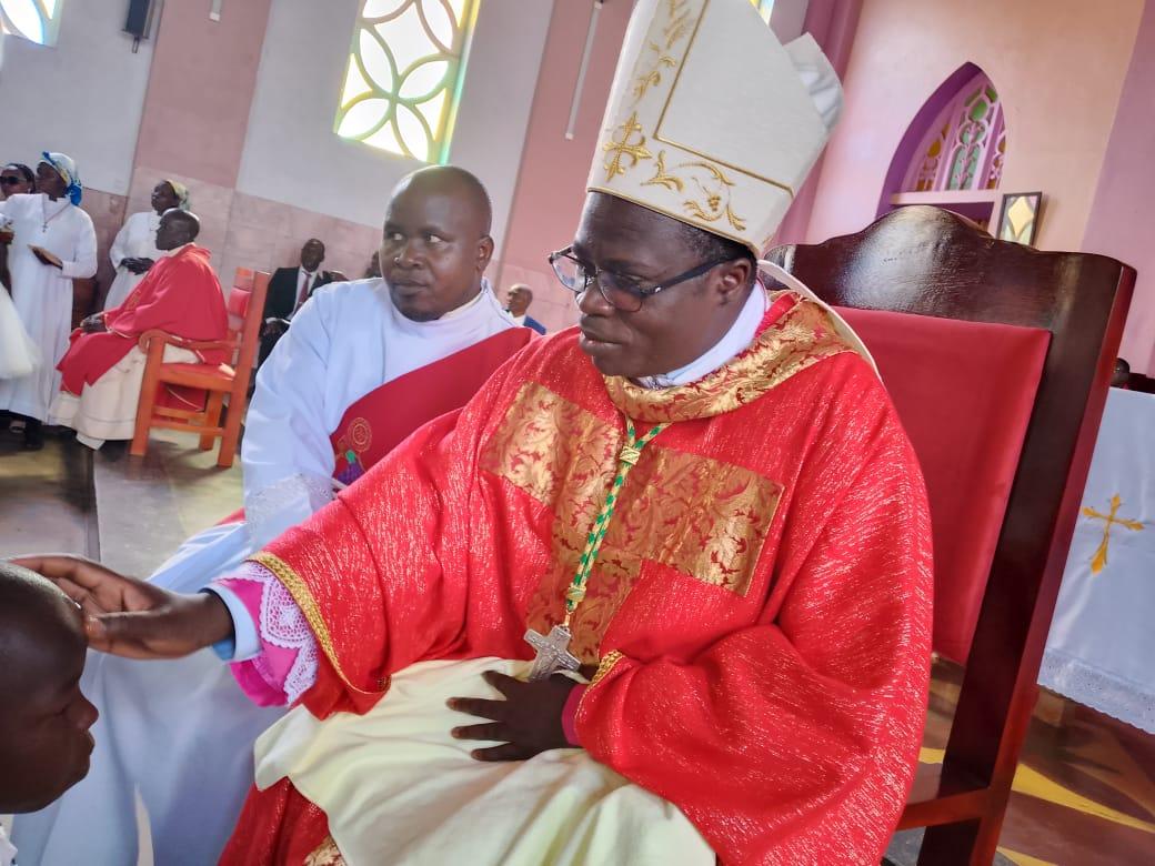 The Bishop of Nebbi Catholic Diocese, Rt. Rev. Rupiny Constantine, administered the Sacrament of Holy Confirmation to learners at Oturgang Catholic Church in Paidha Parish On October 3, 2025. Photo by Mike Rwothomio.