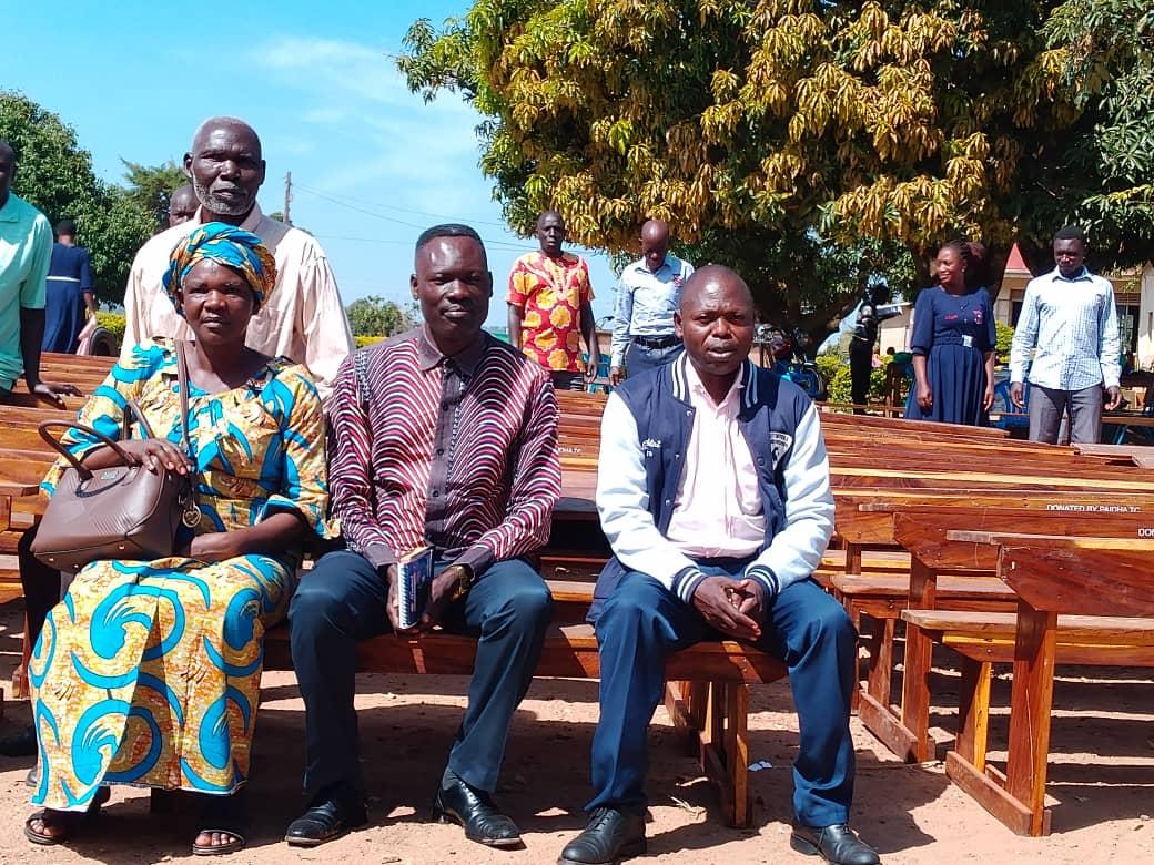 LCIII Paidha town council Innocent Godfred Onega ( middle), along side school headteacher Mvungu Upper ( R)and SMC