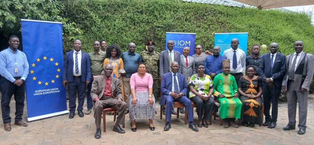 Officials posed for a photo after the end of the two-day stakeholders workshop on cross border meeting facilitated by IOM Ug for West Nile in White Castle Hotel in Arua City.