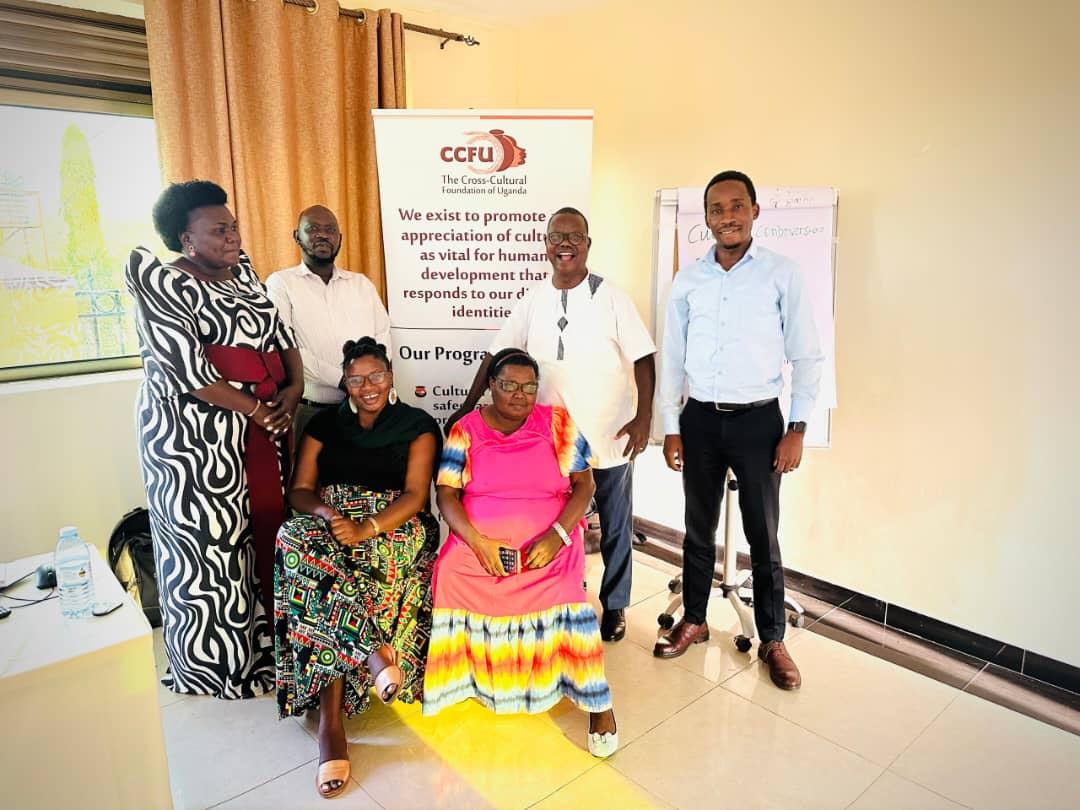 Alur Kingdom officials and other members pose for a photo at the function.