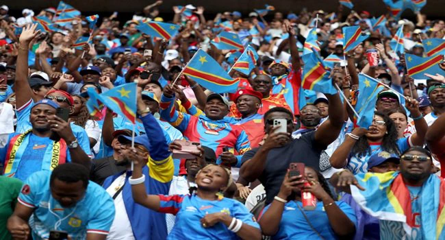 DR Congo fans cheer for their team during the 2026 FIFA World Cup qualifiers final playoff football match between the Democratic Republic of the Congo and Jamaica at the Akron Stadium in Zapopan, Jalisco state, Mexico, on March 31, 2026. (Photo by Ulises Ruiz / AFP)
