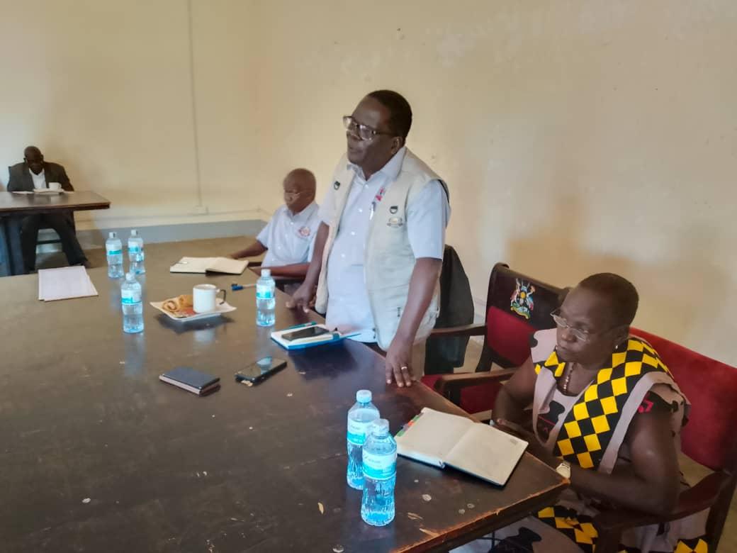 Canon Kura Vasco , the council's chairperson addresses the newly launched committees at the Zombo district headquarters.