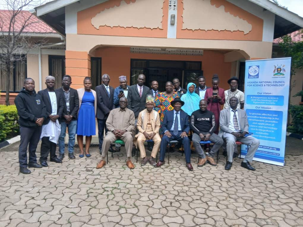 Jadipu Prince Lawrence Opar Angala (seated centre, wearing a black hat) poses for a group photo with officials from the Uganda National Council for Science and Technology, alongside representatives of West Nile-based cultural institutions, following a consultative meeting held recently in Arua City.