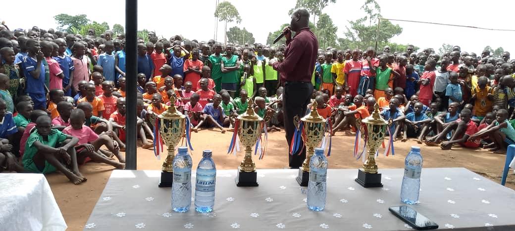 LC V Chairperson James Oruna Uyullu adressing athletes last Friday at Zombo Upper primary school playgrounds.[Photo by Alex Pithua]