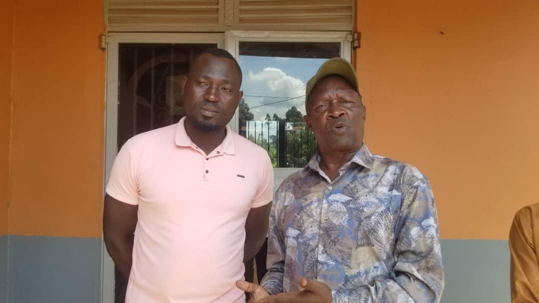 Alur kingdom Prime Minister Prince Lawrence Opar Angala ( Right) and COLEIN AID Executive Director Dan Pikisa after an engagement.