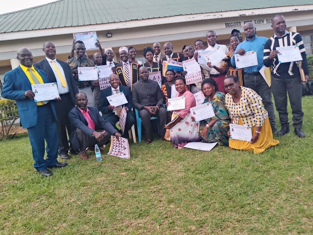 Zombo Councillors and leaders posed for a photo with their awarded certificates after the session