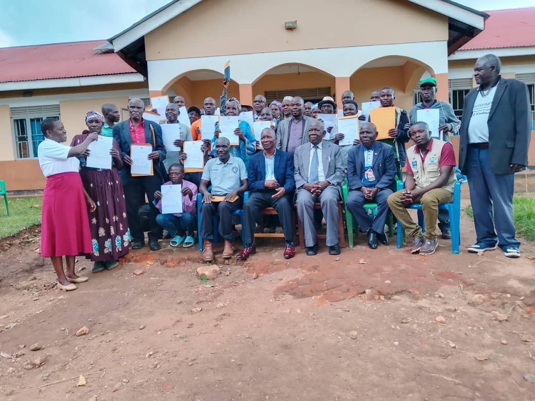 Alur Kingdom Prime Minister (Jadipu) Prince Lawrence Opar Angala (seated centre in a black coat) presided over the handover ceremony of Certificates of Customary Land Ownership to beneficiaries in Atyak Sub-County today, Tuesday, May 12, 2026. The event was organised by Life Concern, a local NGO, with financial support from the Embassy of the Kingdom of the Netherlands in Uganda.