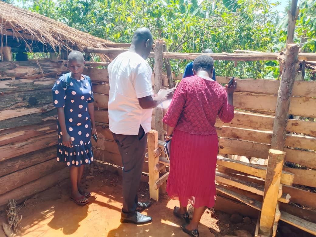 A team of district stakeholders led by Zombo's LCV Chairperson James Oruna Oyullu, inspects a site in Ndili Village