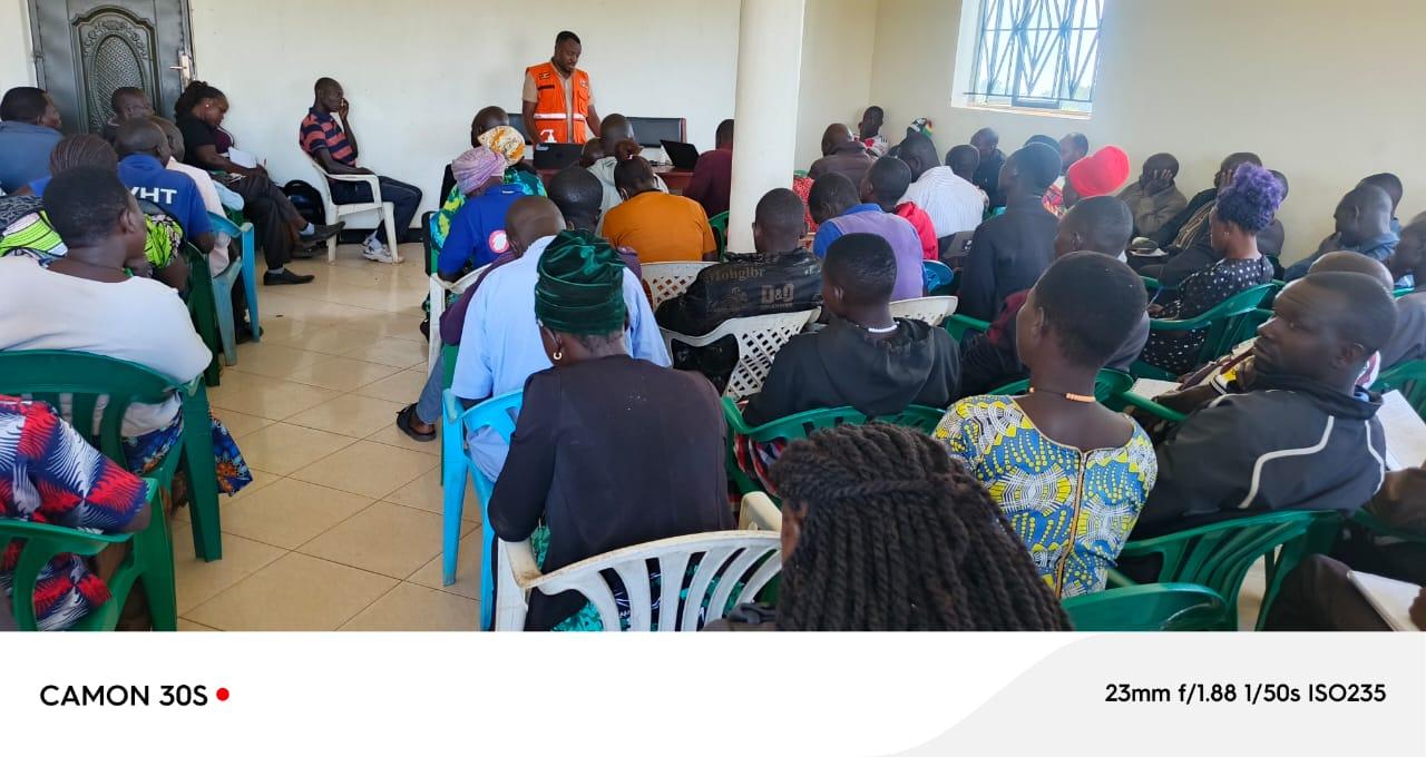 Dr. Brian Odaga from MoH training Zombo district VHTS on Ebola surveillance and reporting.(Photo by Alex Pithua)