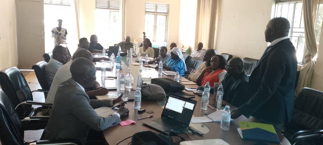 MoH and ADRA holding engagement meeting with Zombo district Ebola taskforce recently. ( By Alex Pithua)