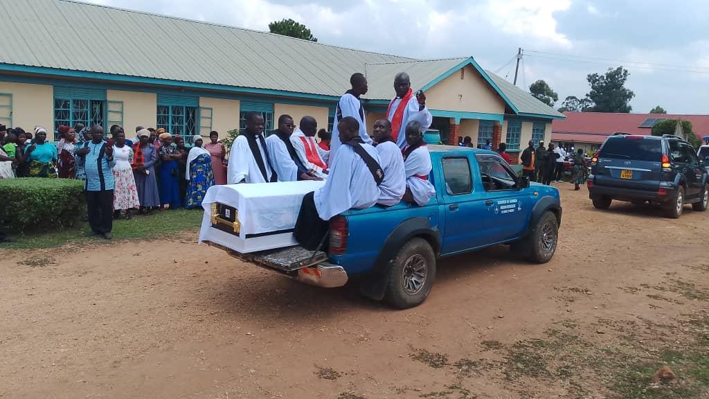 Fellow clergy, in a moving display of brotherly love and grief, personally transported their senior colleague