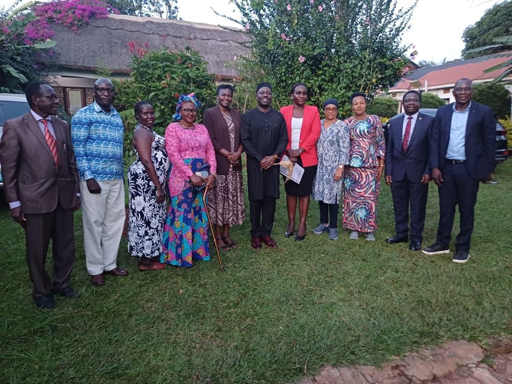 His Majesty Ubimu Phillip Rauni Olarker III (centre, dressed in black) poses for a group photograph with Alur Kingdom officials and representatives of APWAN following the engagement meeting.