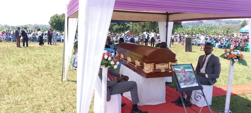 General Overseer Bishop Bagoza Charles preaching gospel to thousands of mourners during the burial of late Bishop John Okethwengu at Adhingi primary school in Zombo district. (Photo by Alex Pithua)