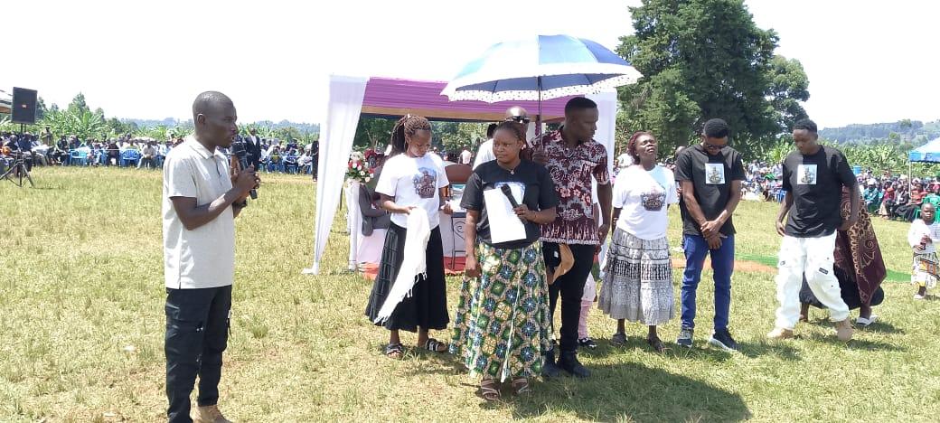 General Overseer Bishop Bagoza Charles preaching gospel to thousands of mourners during the burial of late Bishop John Okethwengu at Adhingi primary school in Zombo district. (Photo by Alex Pithua)