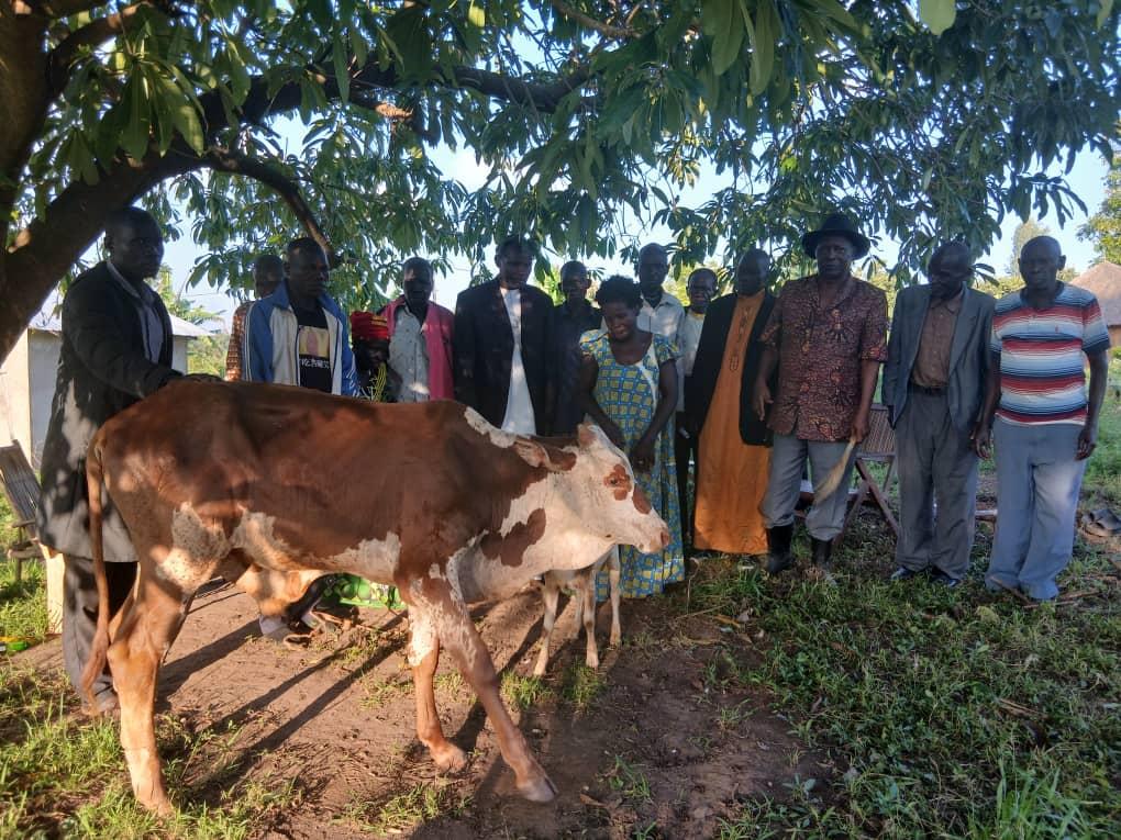 Jadipu Prince Lawrence Opar Angala poses for photo with Crown Prince Ngabipara Albert (left) of Kaal Arikpa after the BULL handover ceremony at Kaal Atyak on Wednesday 13th August 2026.