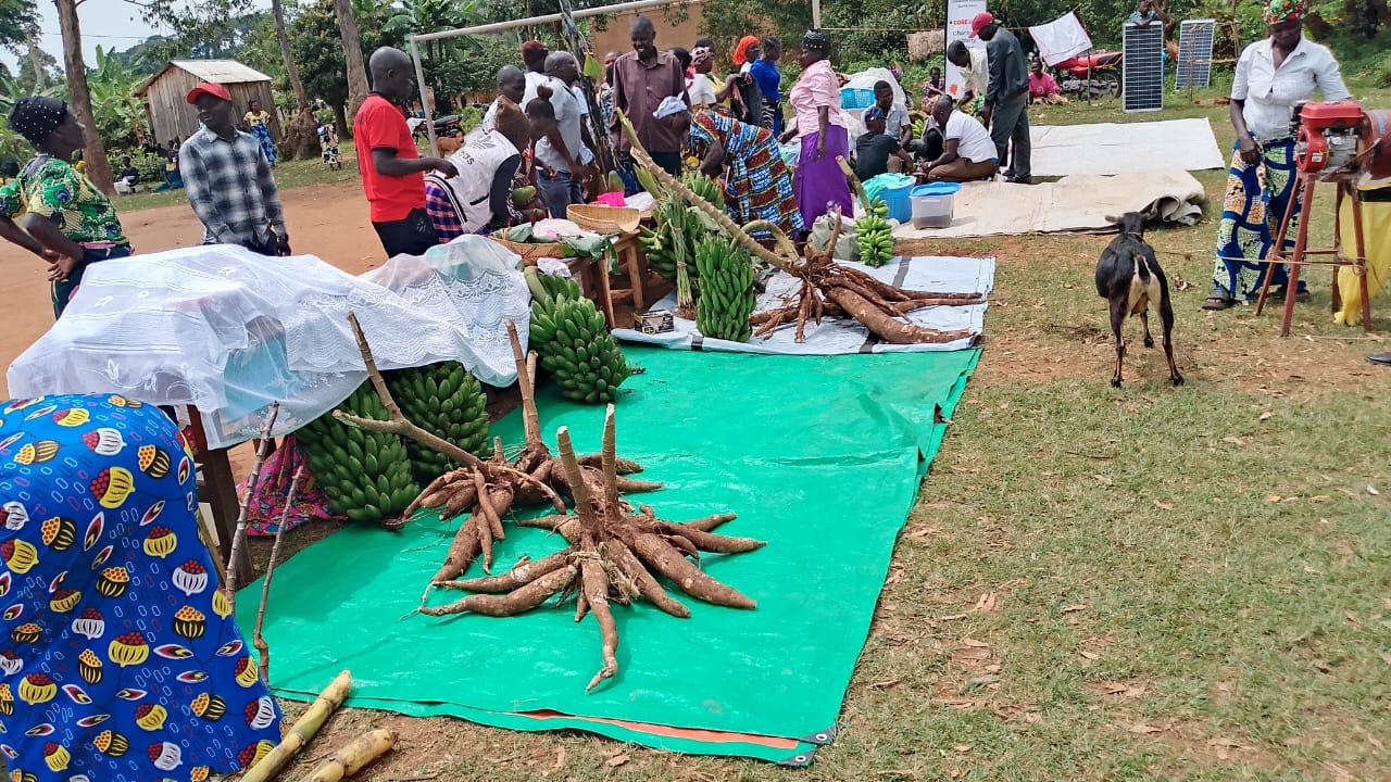 Moureen Wilembe interacts with farmers during the farmers day.