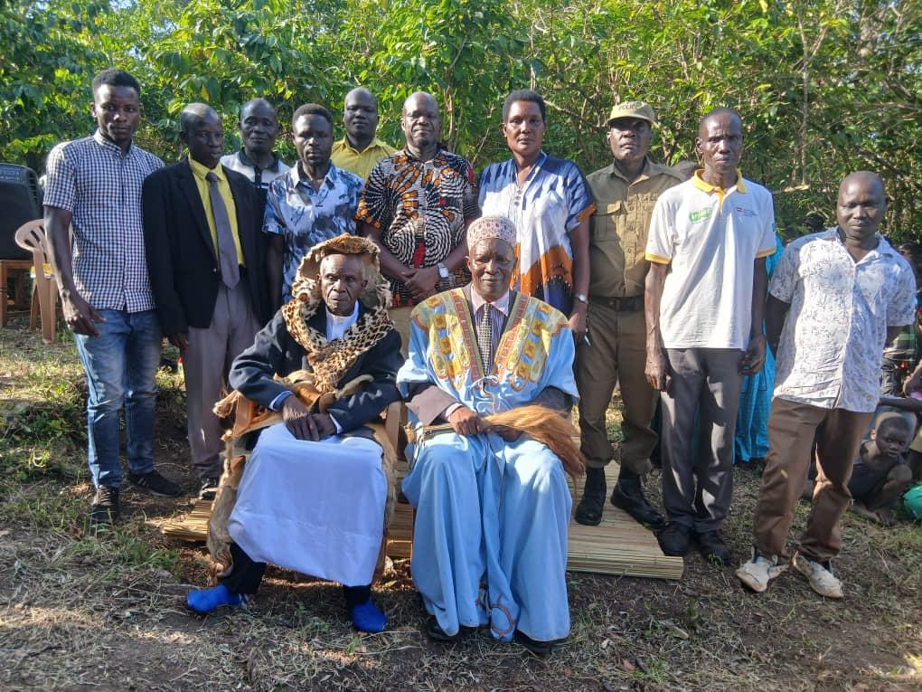 Newly installed Rwoth of Acer chiefdom Thowarac Samuel Cimvor 1V (seated left) and Ker Jadipu Prince Lawrence Opar Angala with Nebbi District Assistant RDC Owachgiu Donald (centre) and other government officials who attended the enstoolment ceremony.
