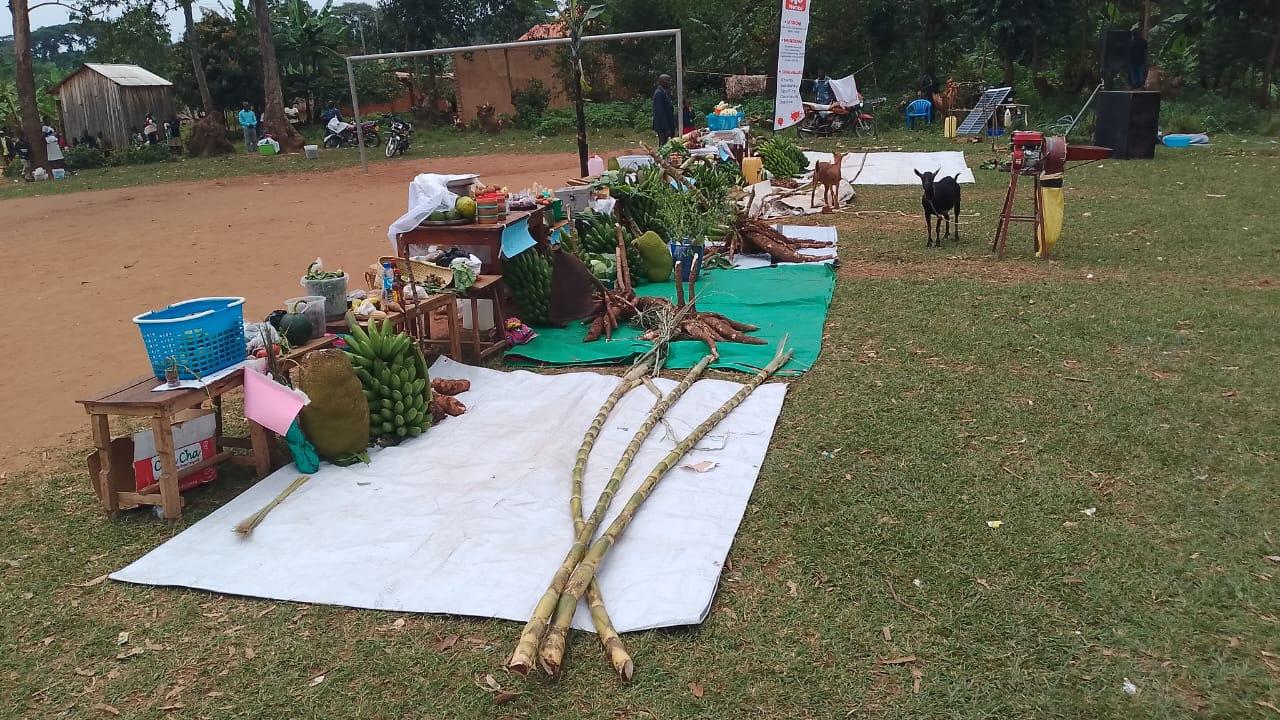 Moureen Wilembe interacts with farmers during the farmers day.