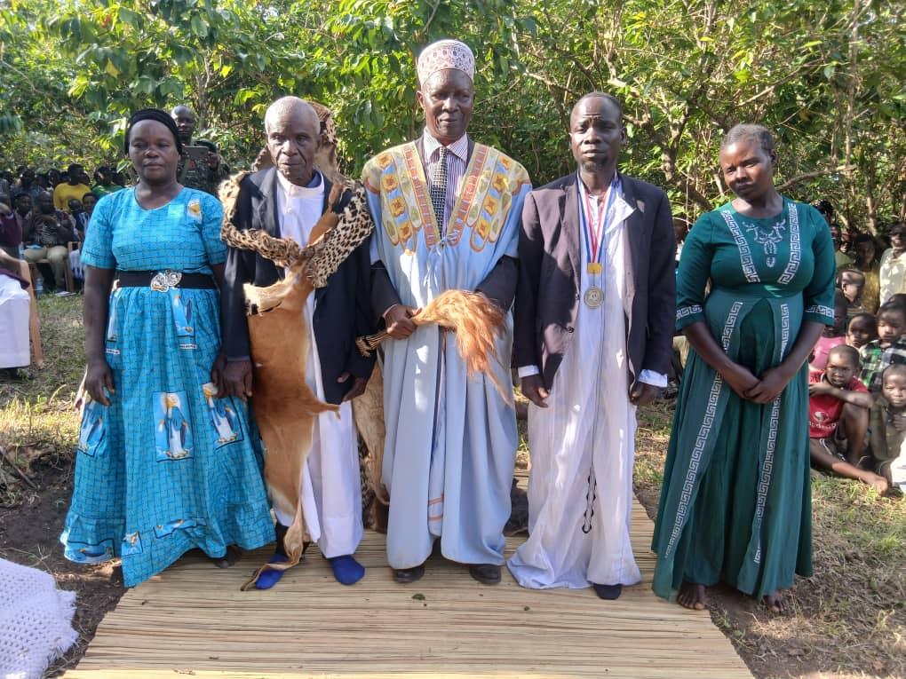Newly installed Rwoth of Acer chiefdom Thowarac Samuel Cimvor 1V (seated left) and Ker Jadipu Prince Lawrence Opar Angala with Nebbi District Assistant RDC Owachgiu Donald (centre) and other government officials who attended the enstoolment ceremony.